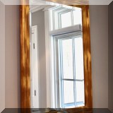 D26. Wooden brushed goldtone beveled mirror. 44”h x 31”w - $225 